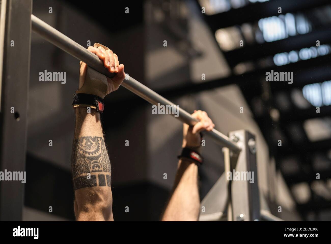 Hands of athlete doing pull ups in gym Stock Photo Alamy