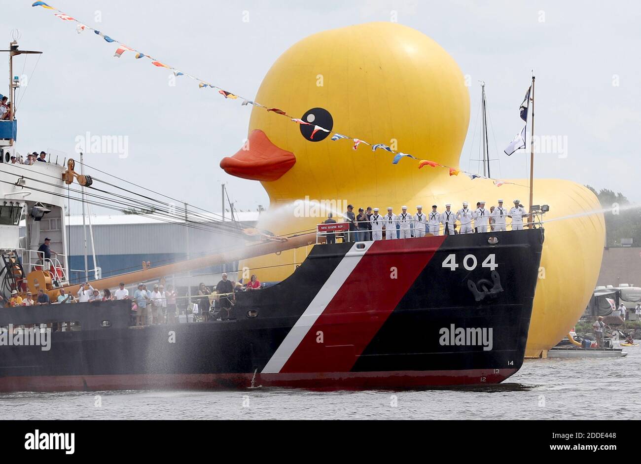 NO FILM, NO VIDEO, NO TV, NO DOCUMENTARY - Tall Ships Duluth 2016 was back in Duluth and featured the world's largest rubber duck at 61 feet tall, about the height of a six-story building, and weighing in at 11 tons, equaling roughly 3,000 real ducks, on Aug. 18, 2016 in Duluth, Minn. The rubber duck was seen being towed past the Sundew, a retired Coast Guard Cutter with water cannons firing. Photo by David Joles/Minneapolis Star Tribune/TNS/ABACAPRESS.COM Stock Photo