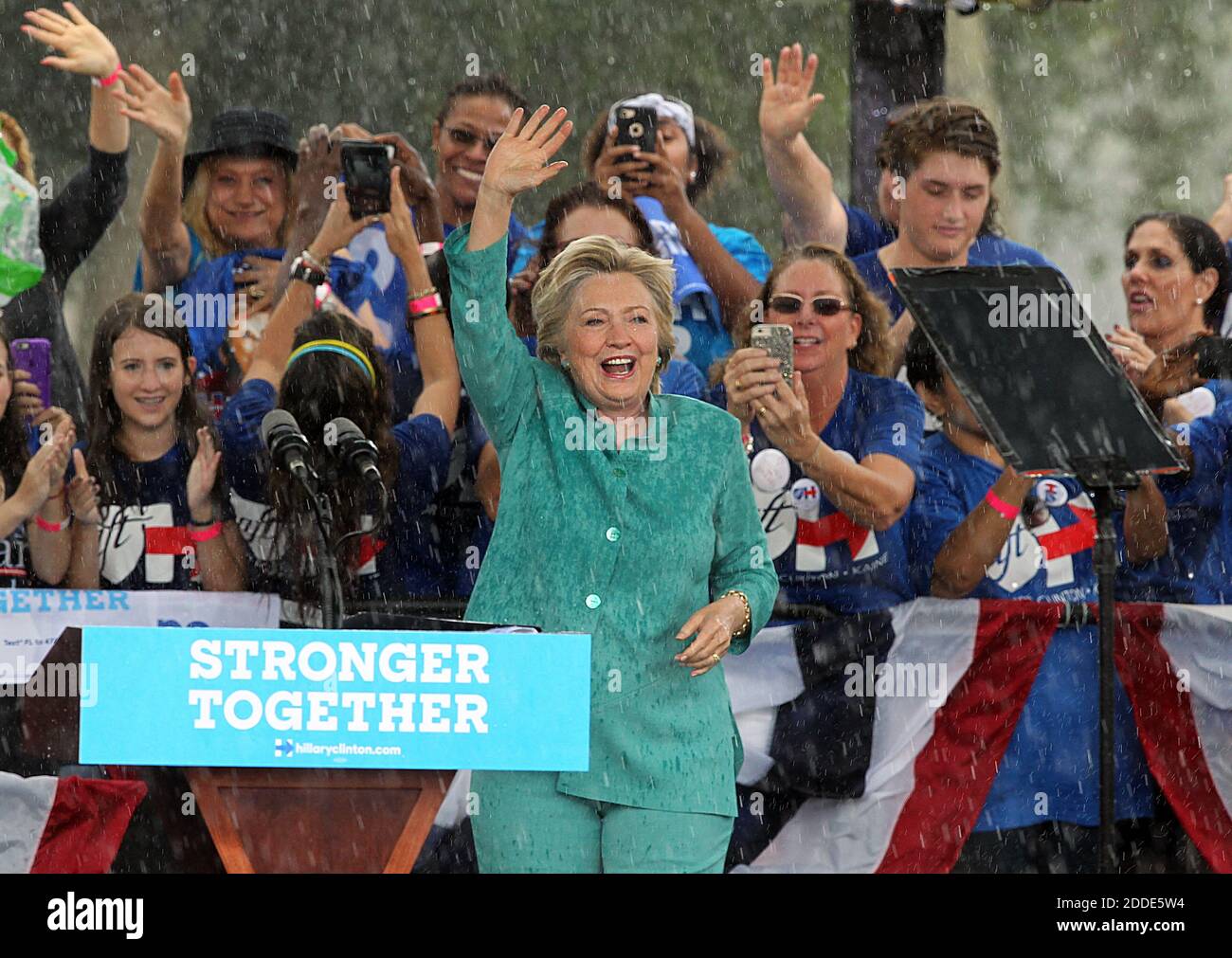 NO FILM, NO VIDEO, NO TV, NO DOCUMENTARY - Democratic presidential candidate Hillary Clinton waves to supporters after stopping her speech due to a downpour during a campaign rally at C.B. Smith Park in Pembroke Pines, FL, USA, on Saturday, November 5, 2016. Photo by Pedro Portal/El Nuevo Herald/TNS/ABACAPRESS.COM Stock Photo