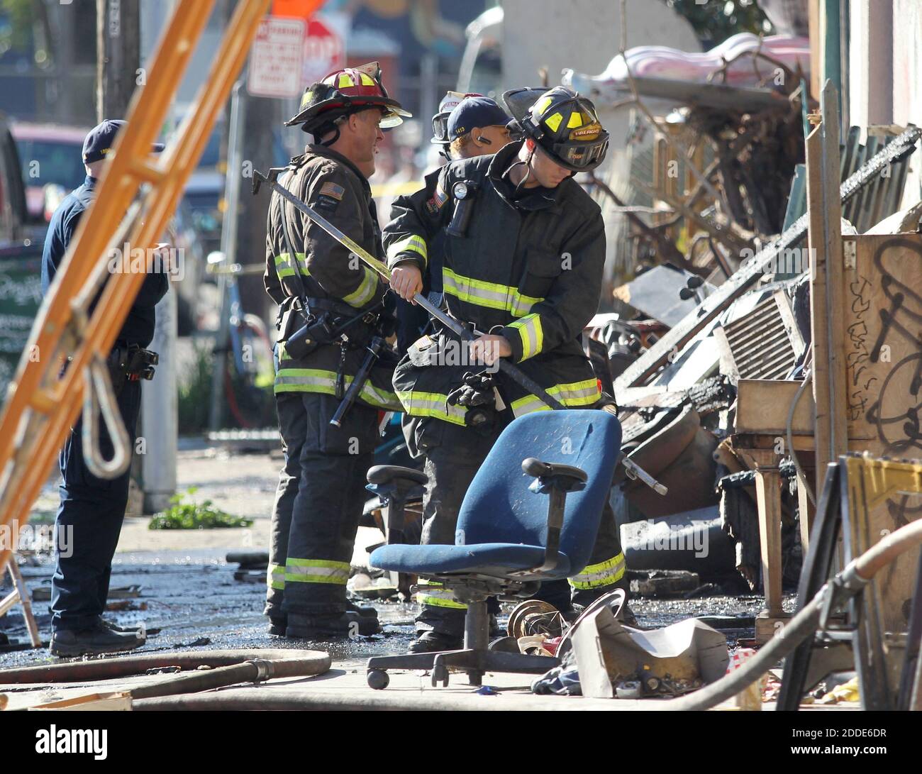 NO FILM, NO VIDEO, NO TV, NO DOCUMENTARY - Firefighters survey a fatal fire where at least nine people died in a warehouse party on 31st Avenue in Oakland, CA, USA, on Saturday, December 3, 2016. Photo by Anda Chu/Bay Area News Group/TNS/ABACAPRESS.COM Stock Photo