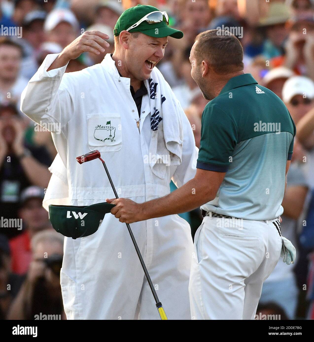 NO FILM, NO VIDEO, NO TV, NO DOCUMENTARY - Caddie Glen Murray, left, embraces Sergio Garcia after Garcia defeated Justin Rose in a one-hole playoff on the 18th green on Sunday, April 9, 2017 at Augusta National Golf Club in Augusta, GA, USA. Photo by Jeff Siner/Charlotte Observer/TNS/ABACAPRESS.COM Stock Photo