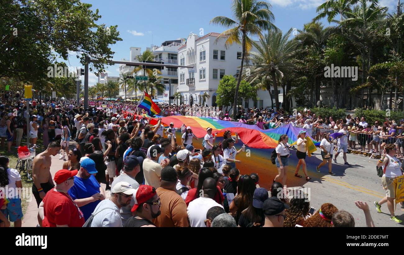 NO FILM, NO VIDEO, NO TV, NO DOCUMENTARY - Members of Safe Schools South  Florida march with a giant rainbow flag during the 2017 Miami Beach Gay  Pride parade on Sunday, April