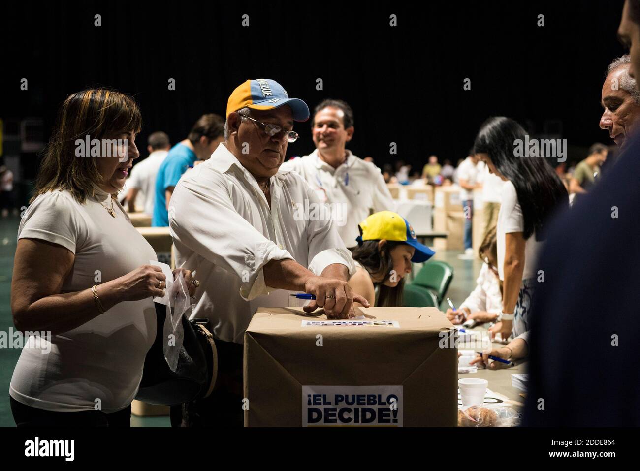 NO FILM, NO VIDEO, NO TV, NO DOCUMENTARY - Eddison Heredia submits his vote in the Venezuelan referendum at the Watsco Center in Coral Gables on Sunday, July 16, 2017. Photo by Bryan Cereijo/Miami Herald/TNS/ABACAPRESS.COM Stock Photo