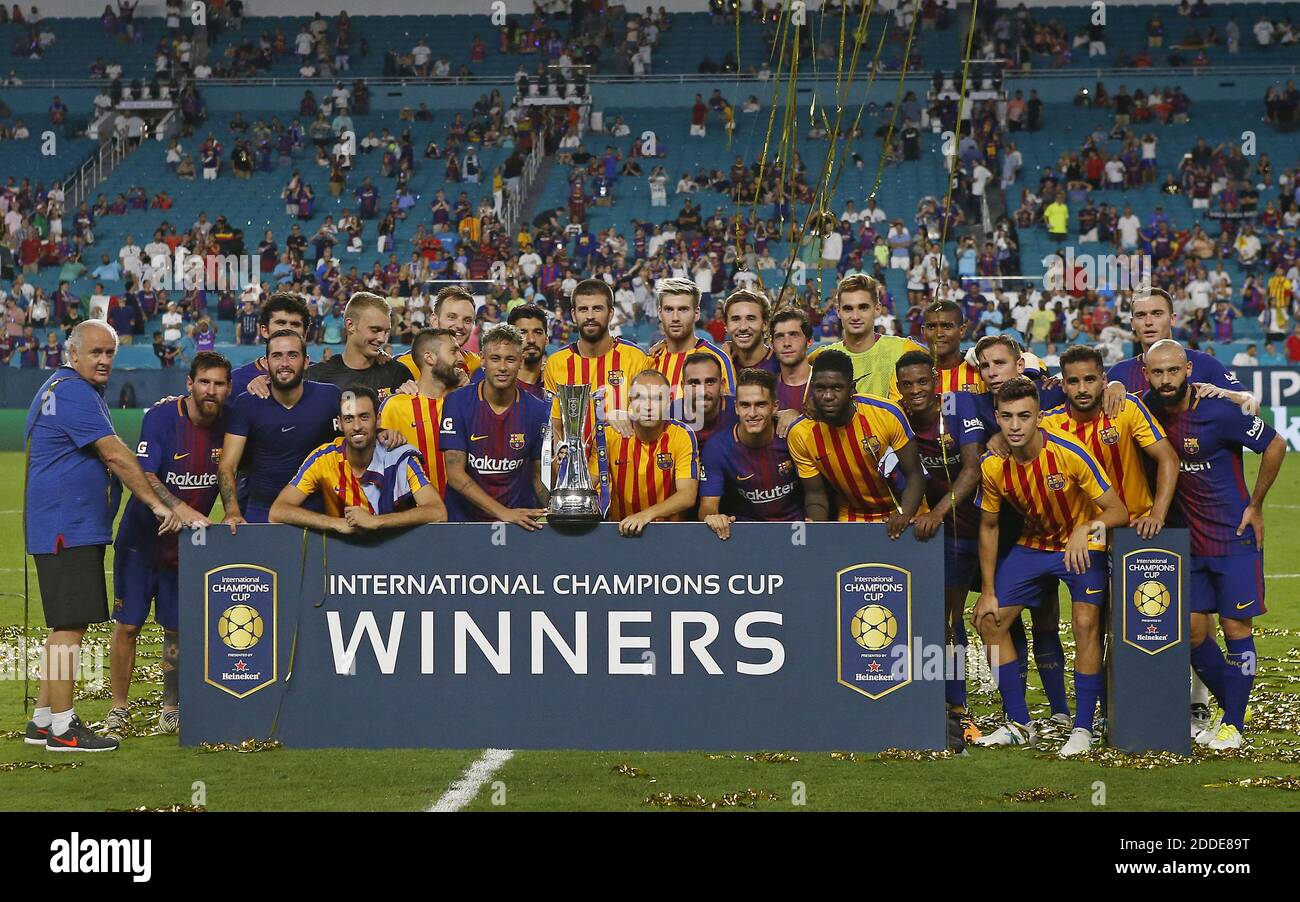 NO FILM, NO VIDEO, NO TV, NO DOCUMENTARY - Barcelona poses with the trophy  after defeating Real Madrid in the International Champions Cup on Saturday,  July 29, 2017, at Hard Rock Stadium