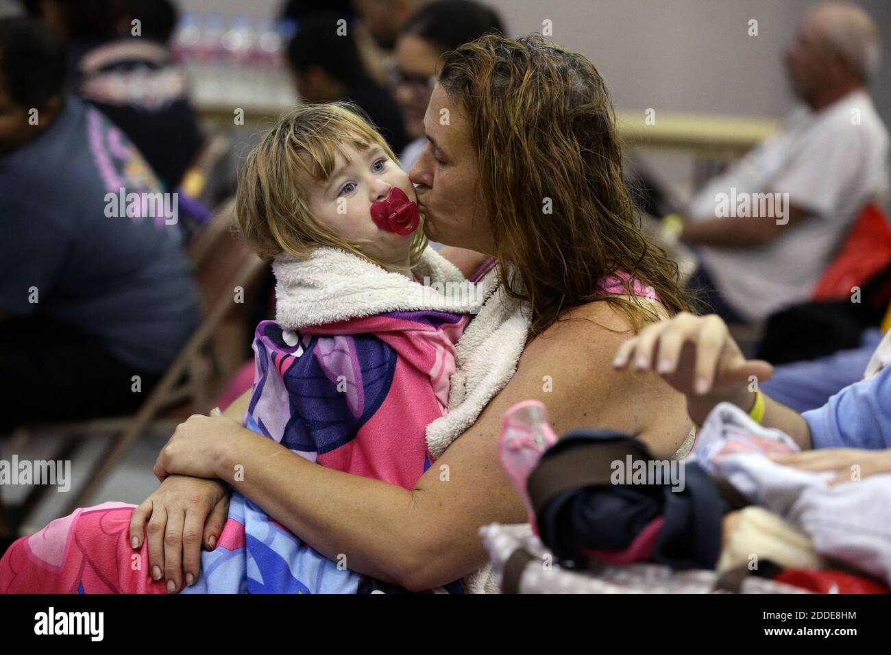 NO FILM, NO VIDEO, NO TV, NO DOCUMENTARY - Heather Howard tries to get her daughter, Emma Howard, 2, to nap while waiting to evacuate from Corpus Christi, Texas, USA as Hurricane Harvey nears the coast on Friday, August 25, 2017. The family wasn't originally planning on evacuating, but they live in a suggested evacuation zone and with five kids and a mom who is 76, she decided it was a good idea to leave this morning. Photo by Rachel Denny Clow/Corpus Christi Caller-Times/TNS/ABACAPRESS.COM Stock Photo
