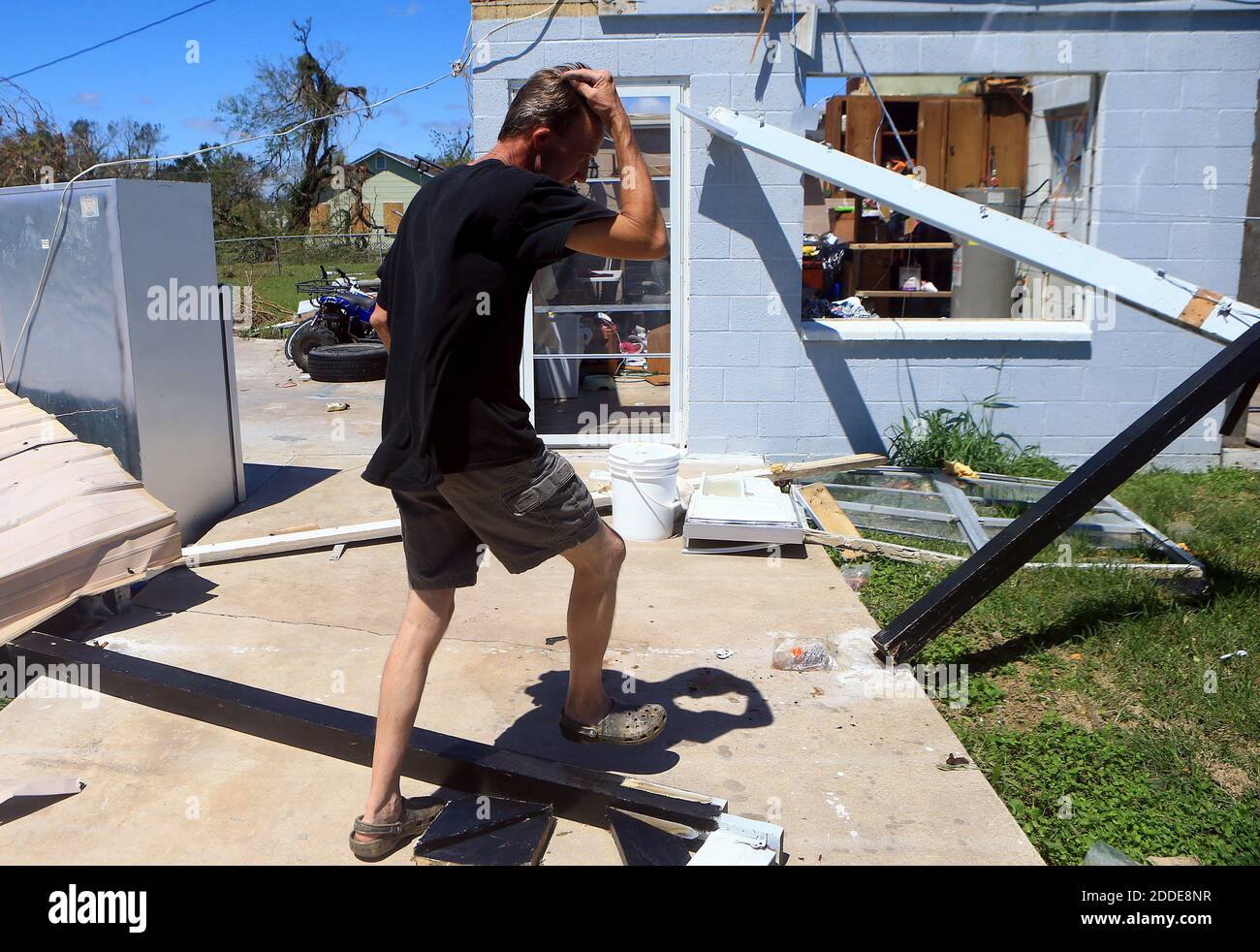 NO FILM, NO VIDEO, NO TV, NO DOCUMENTARY - Dean Weiltzel walks past fallen beams after Hurricane Harvey destroyed his home on Tuesday, August 29, 2017, in Woodsboro, Texas, USA. Photo by Gabe Hernandez/Corpus Christi Caller-Times/TNS/ABACAPRESS.COM Stock Photo
