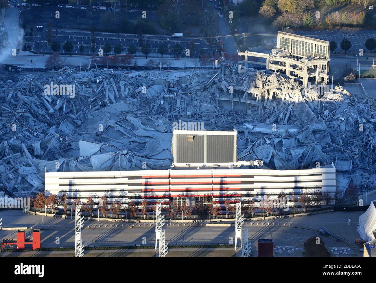 NO FILM, NO VIDEO, NO TV, NO DOCUMENTARY - The remains of the Georgia Dome after it was imploded next to Mercedes-Benz Stadium on Monday, November 20, 2017, in Atlanta, GA, USA. More than 300 pounds of explosives collapsed the steel in the upper ring and about 4,500 pounds of dynamite crumbled the concrete columns of the Atlanta institution of the last 25 years. When the dust cleared, two sections of the Georgia Dome's outside walls were still standing. Photo by Curtis Compton/Atlanta Journal-Constitution/TNS/ABACAPRESS.COM Stock Photo