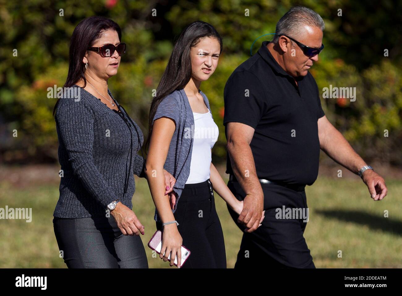 NO FILM, NO VIDEO, NO TV, NO DOCUMENTARY - Mourners arrive at the Fort ...