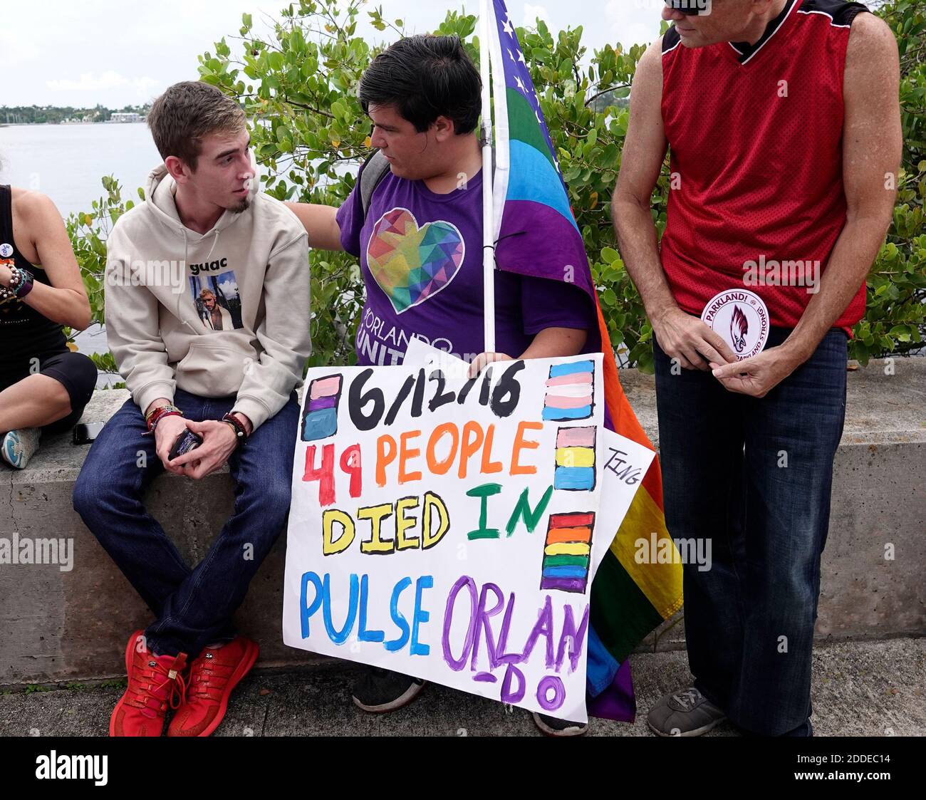 NO FILM, NO VIDEO, NO TV, NO DOCUMENTARY - Marjory Stoneman Douglas High School graduate Sam Zief, left, talks with Samantha Miller of Jensen Beach before a die-in to mark the anniversary NO FILM, NO VIDEO, NO TV, NO DOCUMENTARY - Marjory Stoneman Douglas High School graduate Sam Zief, left, talks with Samantha Miller of Jensen Beach before a die-in to mark the anniversary