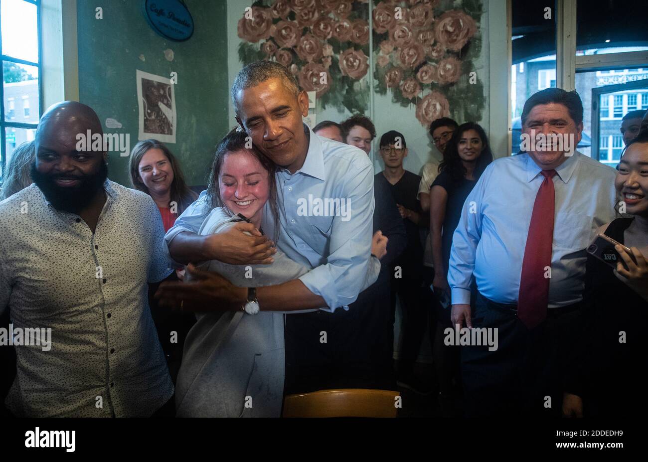 NO FILM, NO VIDEO, NO TV, NO DOCUMENTARY - Former president Barack Obama gives a hug to Rachel Peterson as he makes a campaign stop at Caffe Paradiso with Democratic gubernatorial candidate J.B. Pritzker, right, after speaking at University of Illinois in Urbana, IL, USA, on Friday, September 7, 2018. Photo by Zbigniew Bzdak/Chicago Tribune/TNS/ABACAPRESS.COM Stock Photo