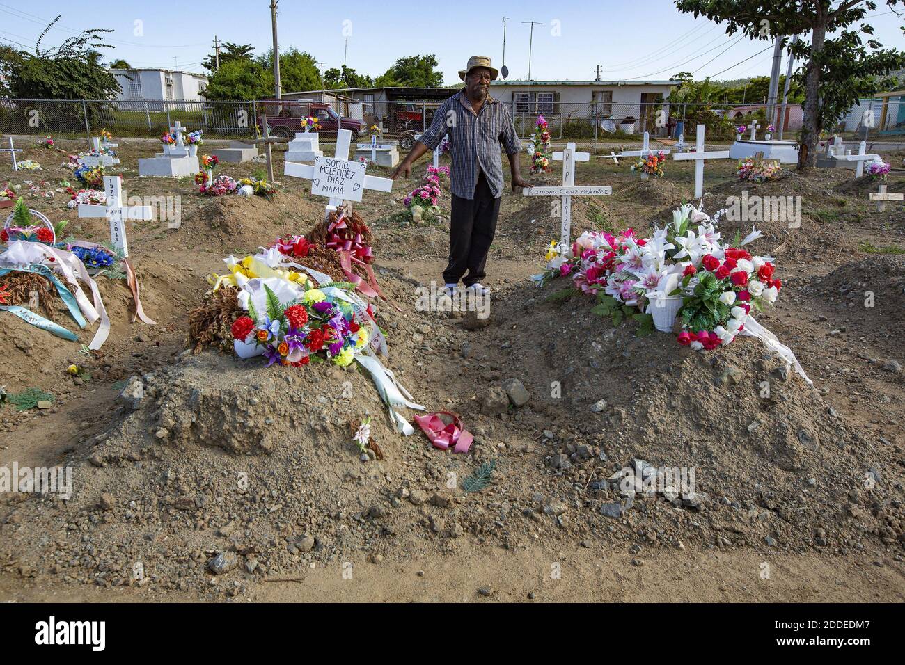 NO FILM, NO VIDEO, NO TV, NO DOCUMENTARY - Dialysis patient Radames Cabral Trinidad, 65, visits the cemetery on Wednesday, August 22, 2018 in Vieques, Puerto Rico. Many of the island's residents who have died are buried here since Hurricane Maria struck the island a year ago. Several of the dead were dialysis patients. Photo by Al Diaz/Miami Herald/TNS/ABACAPRESS.COM Stock Photo
