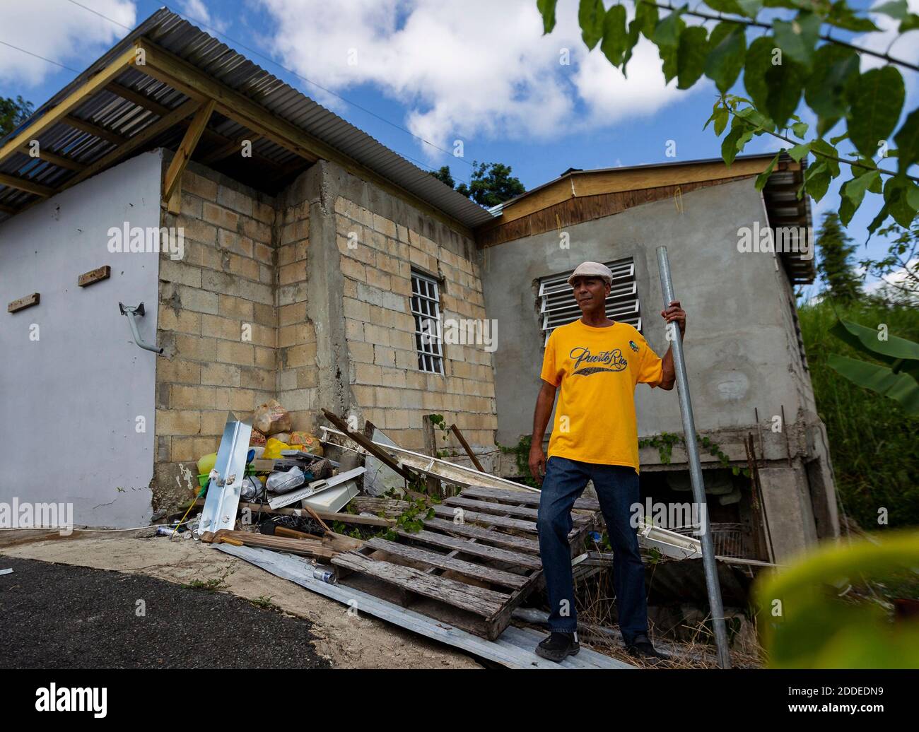 NO FILM, NO VIDEO, NO TV, NO DOCUMENTARY - Fernando Rivera Molina, 60, stands outside his partially repaired home in the La Juncia community in Comerio, Puerto Rico on August 25, 2018. Volunteers helped Rivera Molina put on a new roof after he was twice denied federal aid because he lacked a deed to his property after Hurricane Maria. Photo by Matias J. Ocner/Miami Herald/TNS/ABACAPRESS.COM Stock Photo