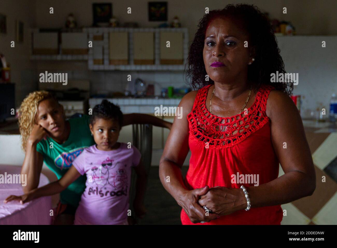 NO FILM, NO VIDEO, NO TV, NO DOCUMENTARY - Merry Perez Colon, 51, her daughter Yeisha Zayas Perez, 27, and her granddaughter, Nathanais Kamila Reyes Zayas, 5, live in a hurricane damaged home in the La Juncia community in Comerio, Puerto Rico on August 25, 2018. Perez Colon, whose husband is disabled, is repairing the home herself after the family was denied federal disaster aid. Photo by Matias J. Ocner/Miami Herald/TNS/ABACAPRESS.COM Stock Photo