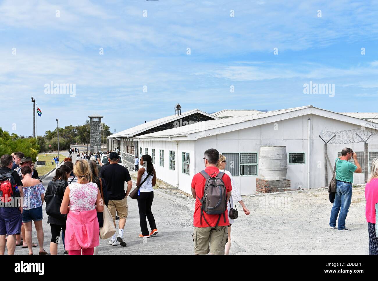 Visitors take a guided tour of the maximum security prison on Robben Island, Cape Town, South Africa Stock Photo