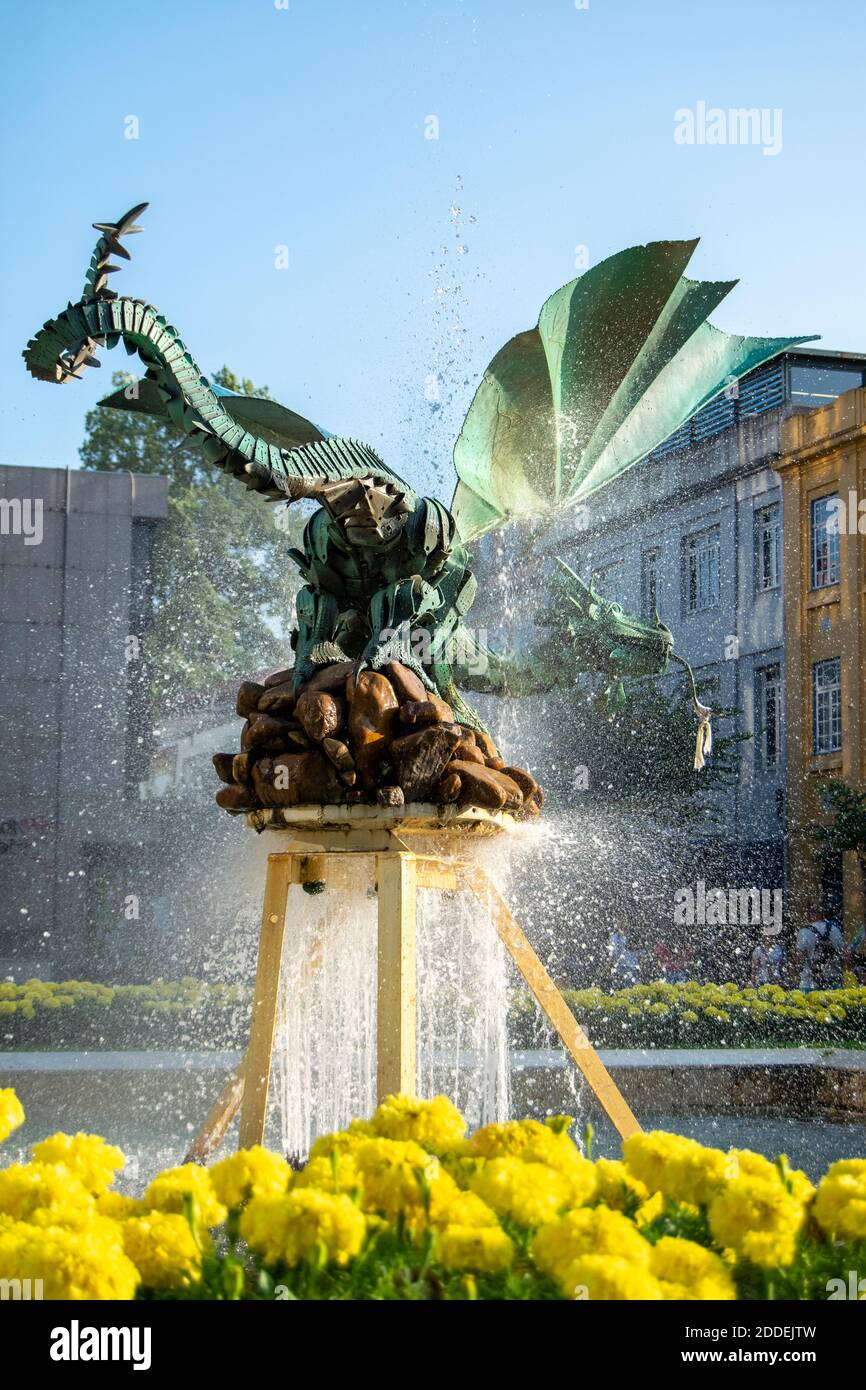 Dragon bronze statue over a fountain in Braga made by artist Aureliano Aguiar, Portugal Stock Photo