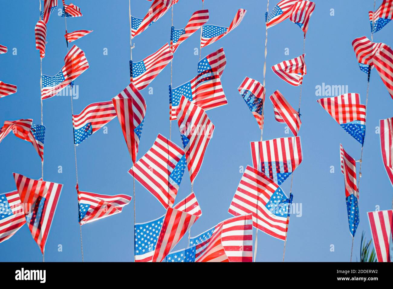 Florida Ft. Fort Lauderdale Las Olas Riverfront,flags banners against blue sky, Stock Photo