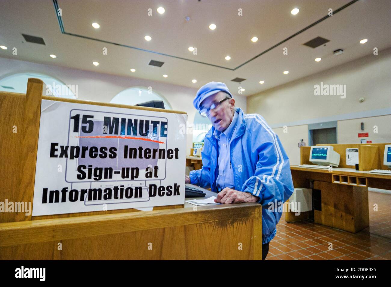Miami Florida,City Main Library inside interior,15 Minute Express Internet senior man using uses computer station, Stock Photo