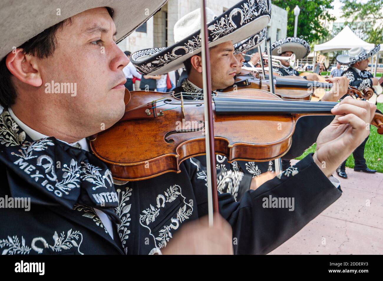 Miami Beach Florida,Collins Park Mexico Cinco de Mayo celebration,mariachi musician plays playing violin Hispanic man outfit sombrero, Stock Photo