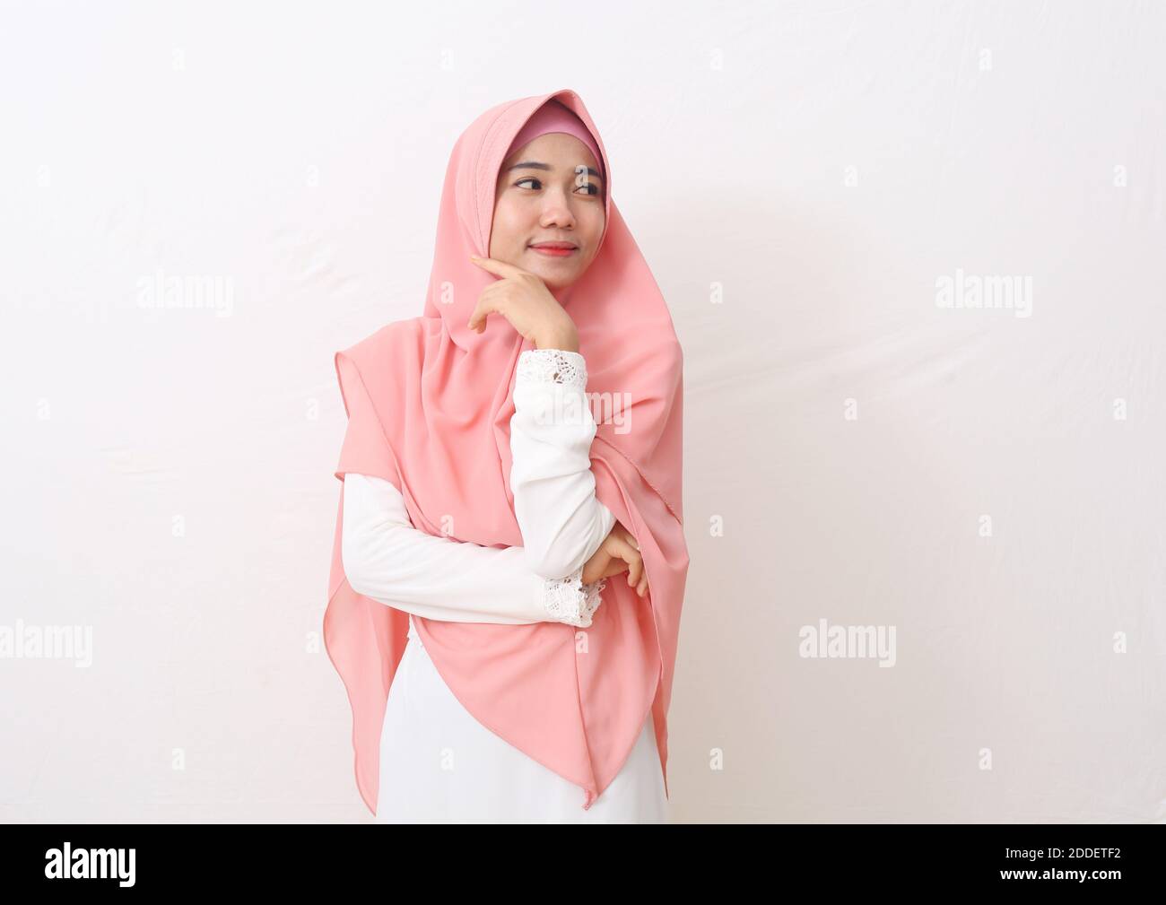 A portrait of happy asian muslim woman wearing a veil or hijab ...
