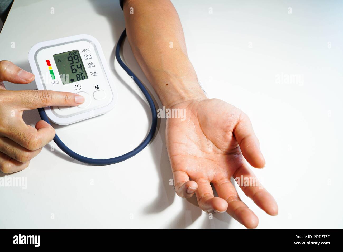 Men's health check blood pressure.and heart rate with digital pressure