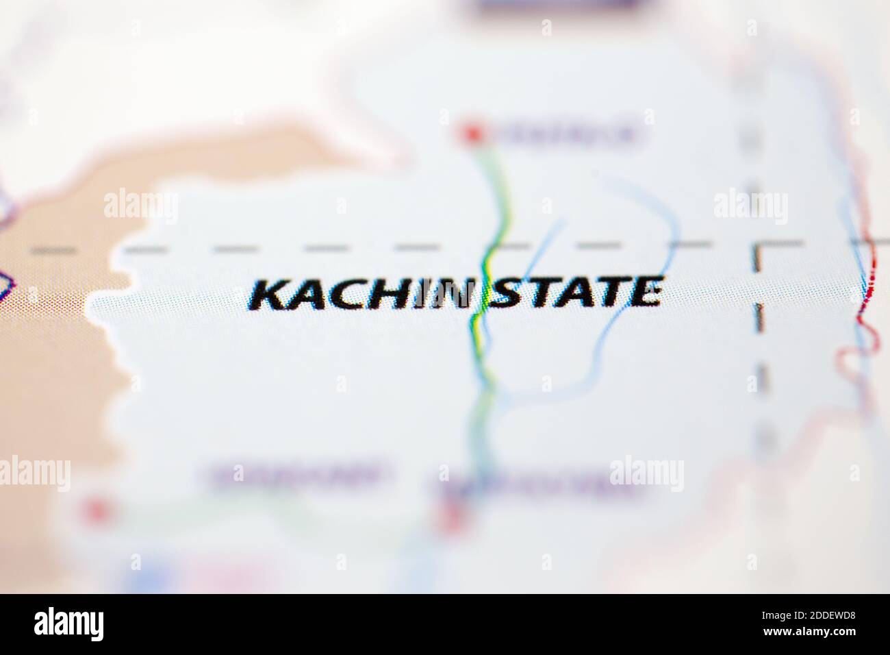 Shallow depth of field focus on geographical map location of Kachin State Myanmar Asia continent on atlas Stock Photo