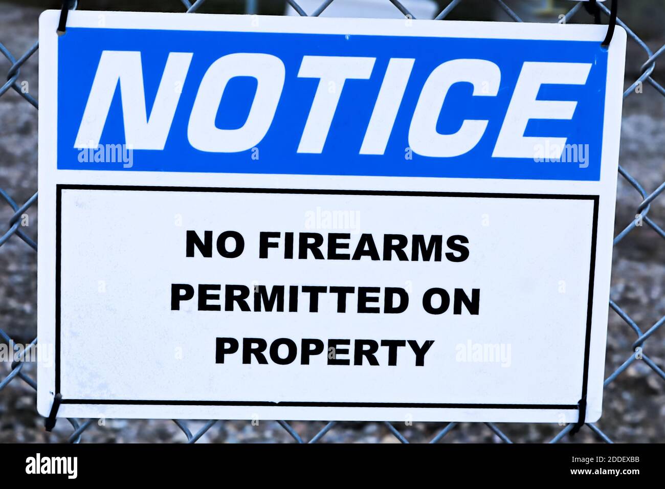 A Notice, No Firearms Permitted on Property sign Stock Photo