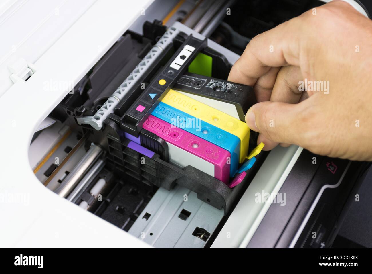 Technicians are install setup the ink cartridge of a inkjet printer the ...