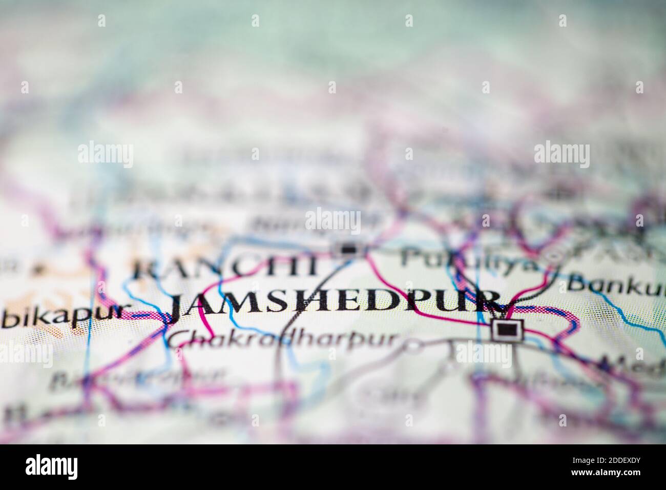 Shallow depth of field focus on geographical map location of Jamshedpur India Asia continent on atlas Stock Photo