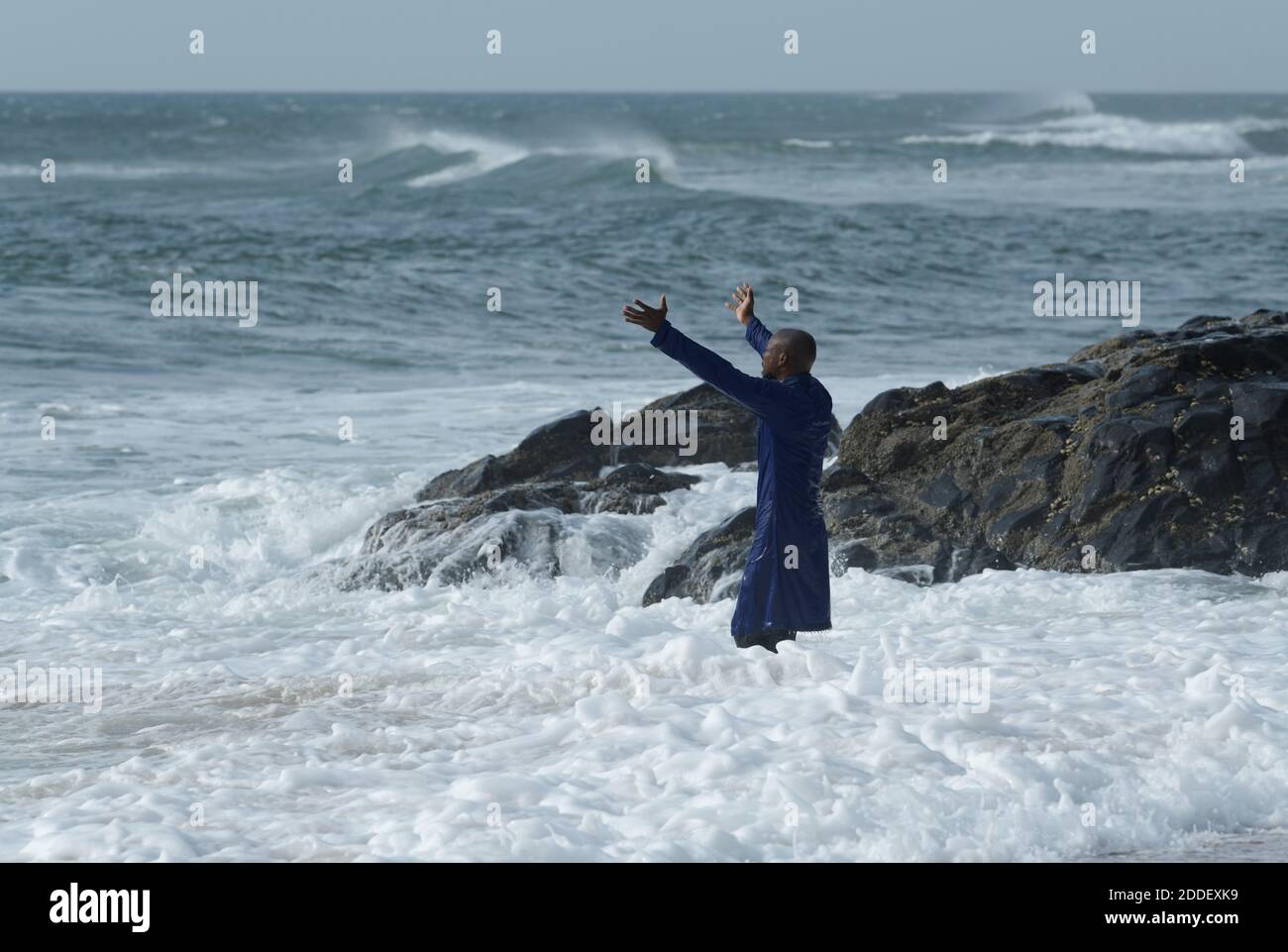 Religion, worship, faith, single adult man, spiritual cleansing ceremony in water, people, landscape, Durban, South Africa, ethnic, ritual, activity Stock Photo