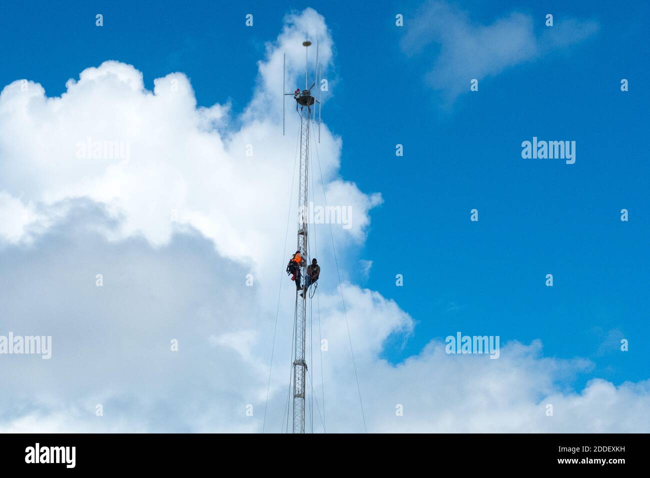 Workers repairing a communication antenna , Yucatan Mexico Stock Photo