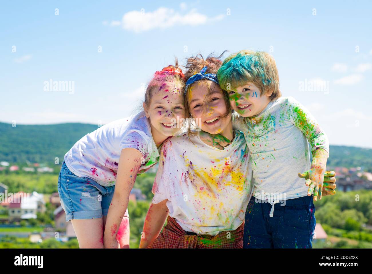 Kids painted in the colors of Holi festival. Stock Photo