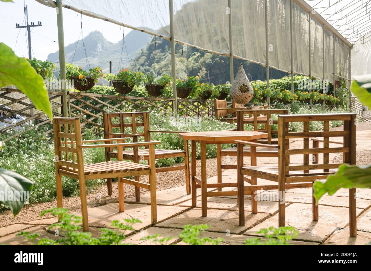 Garden furniture in relaxing garden Stock Photo Alamy