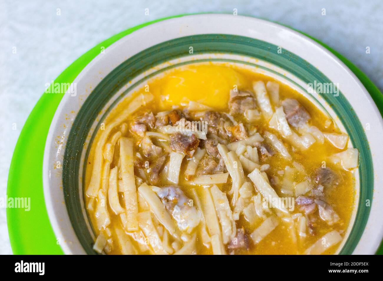 Filipino noodle soup called miki at a local restaurant in Abra