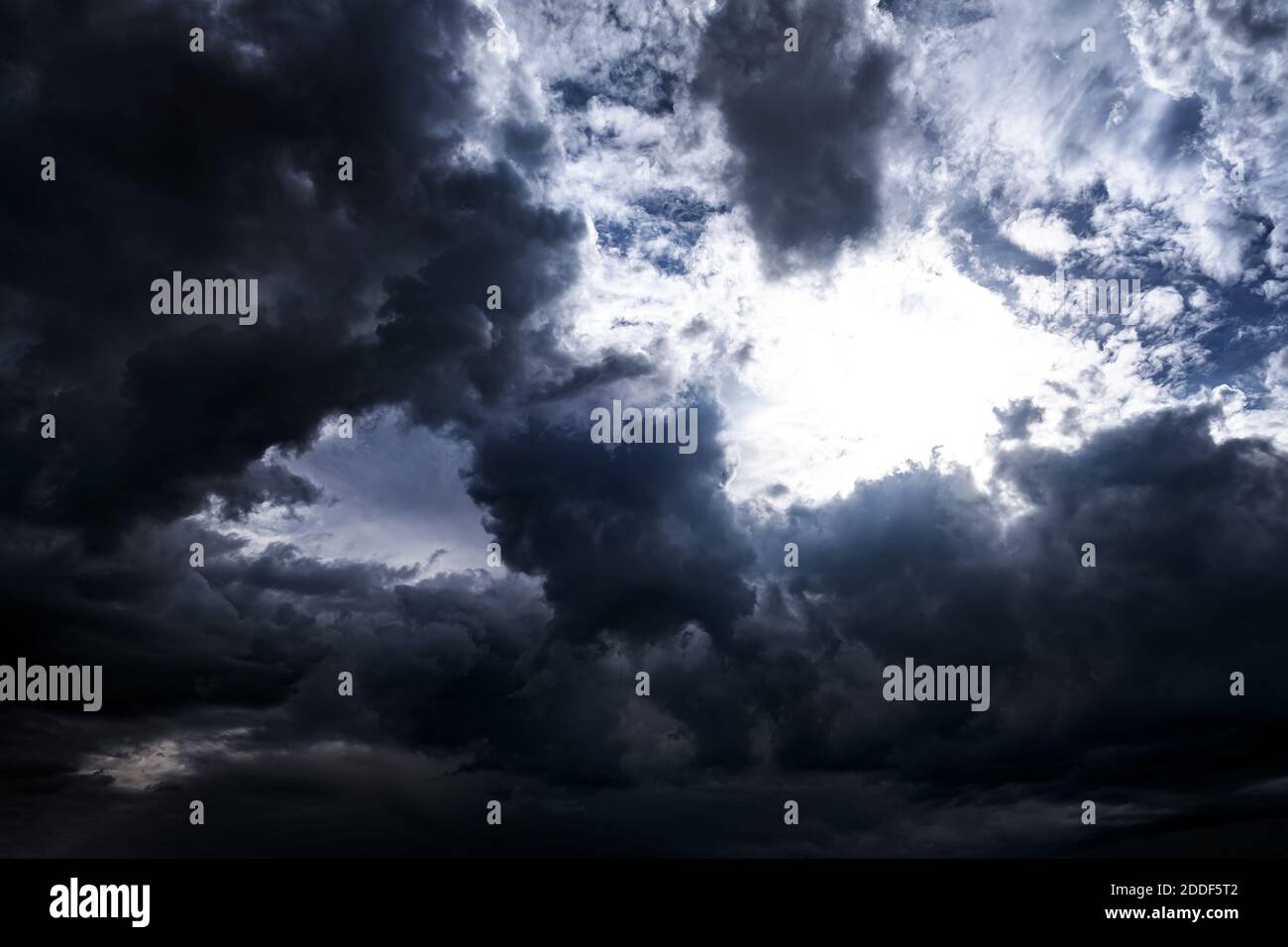 Light in the Dark and Dramatic Storm Clouds Stock Photo - Alamy