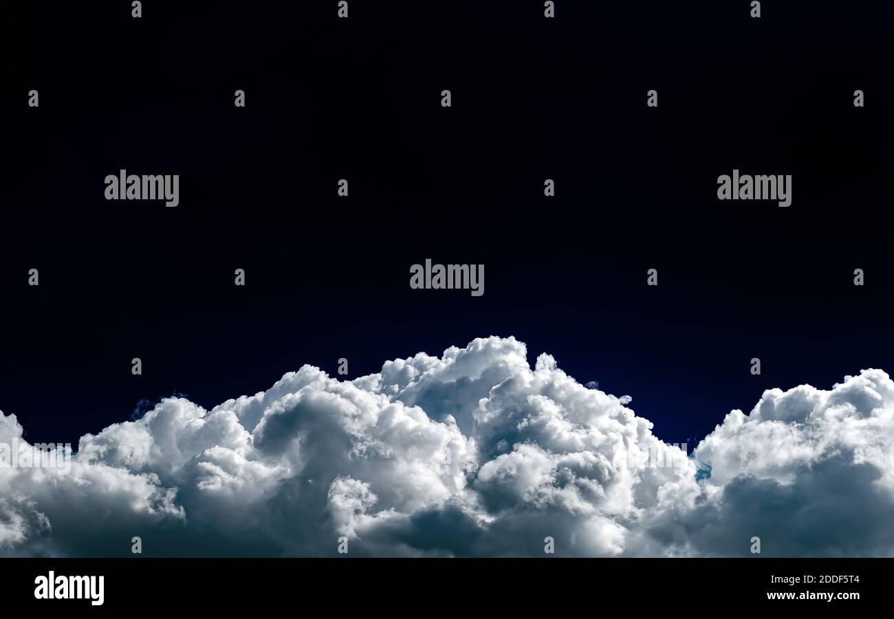 Dark and Dramatic Storm Clouds Area Background Stock Photo
