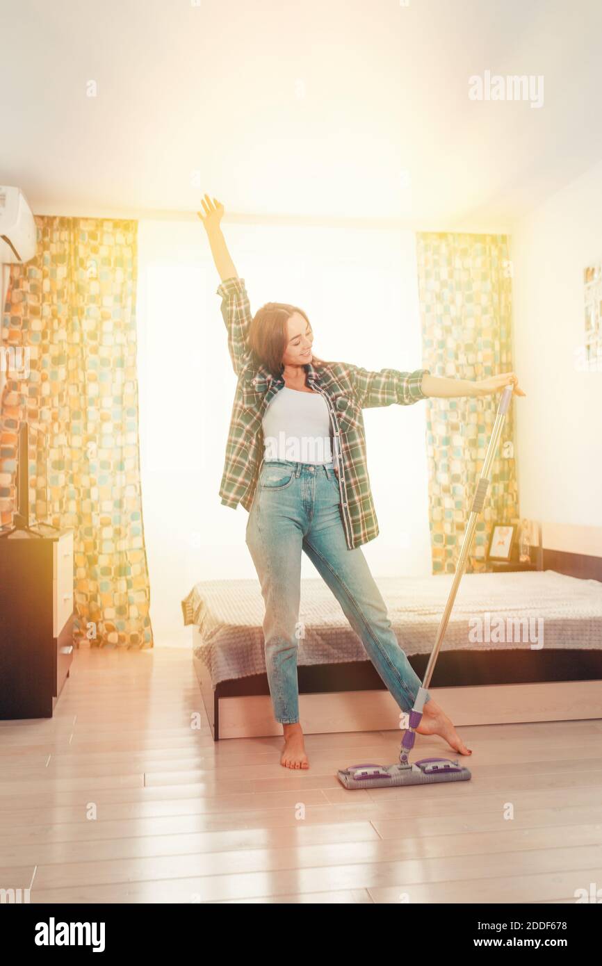 Cleaning concept. Beautiful young woman doing cleaning