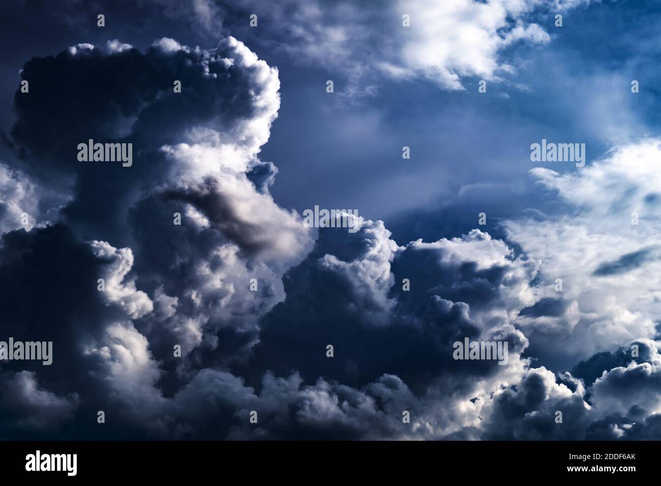 Dark and Dramatic Storm Clouds Area Background Stock Photo