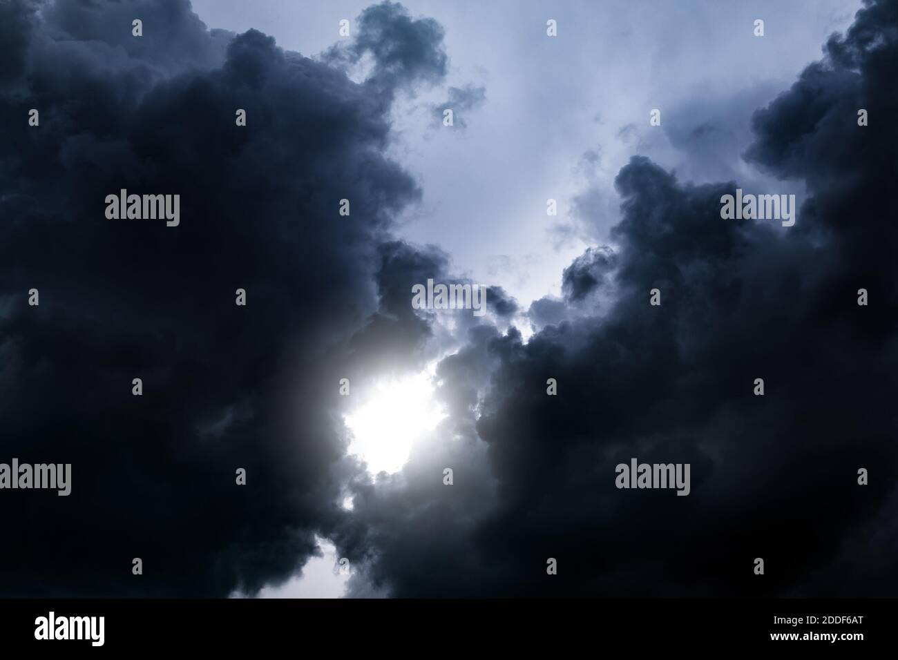 Light in the Dark and Dramatic Storm Clouds Stock Photo - Alamy