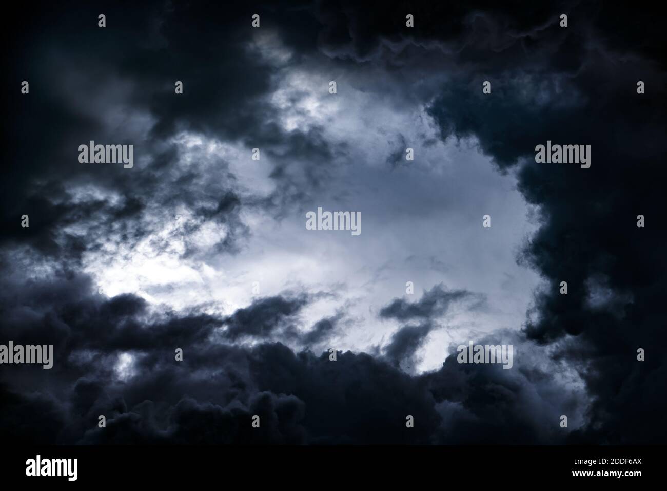 Dark and Dramatic Storm Clouds Area Background Stock Photo