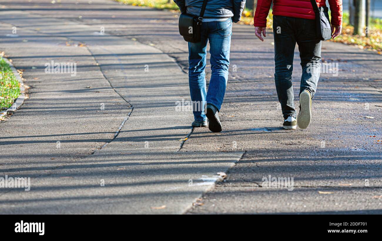 Closeup feet walking sidewalk hi-res stock photography and images - Alamy