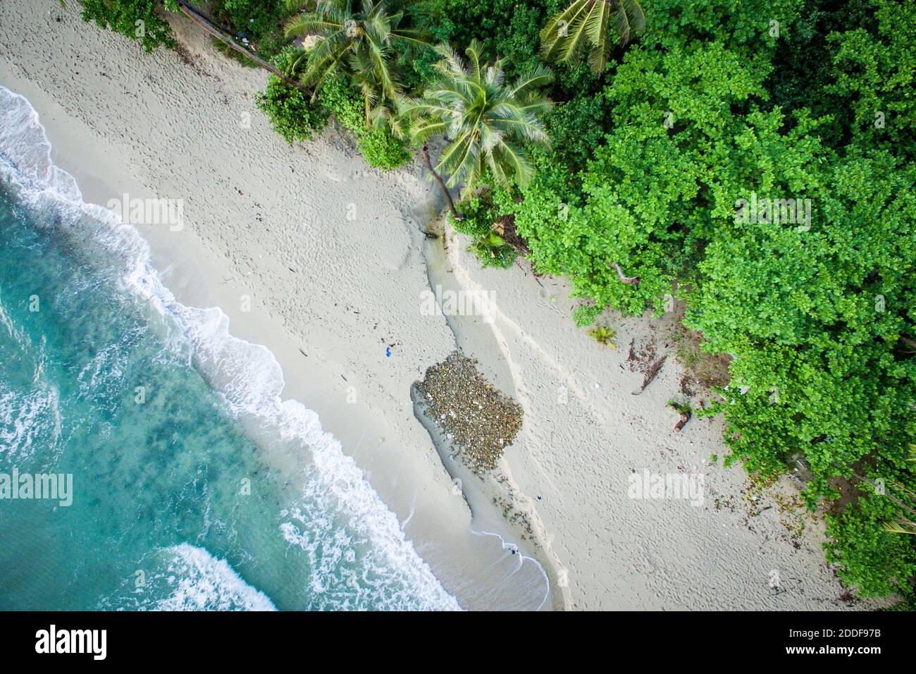 Aerial view of tropical white sand beach with jungle and ocean Stock ...