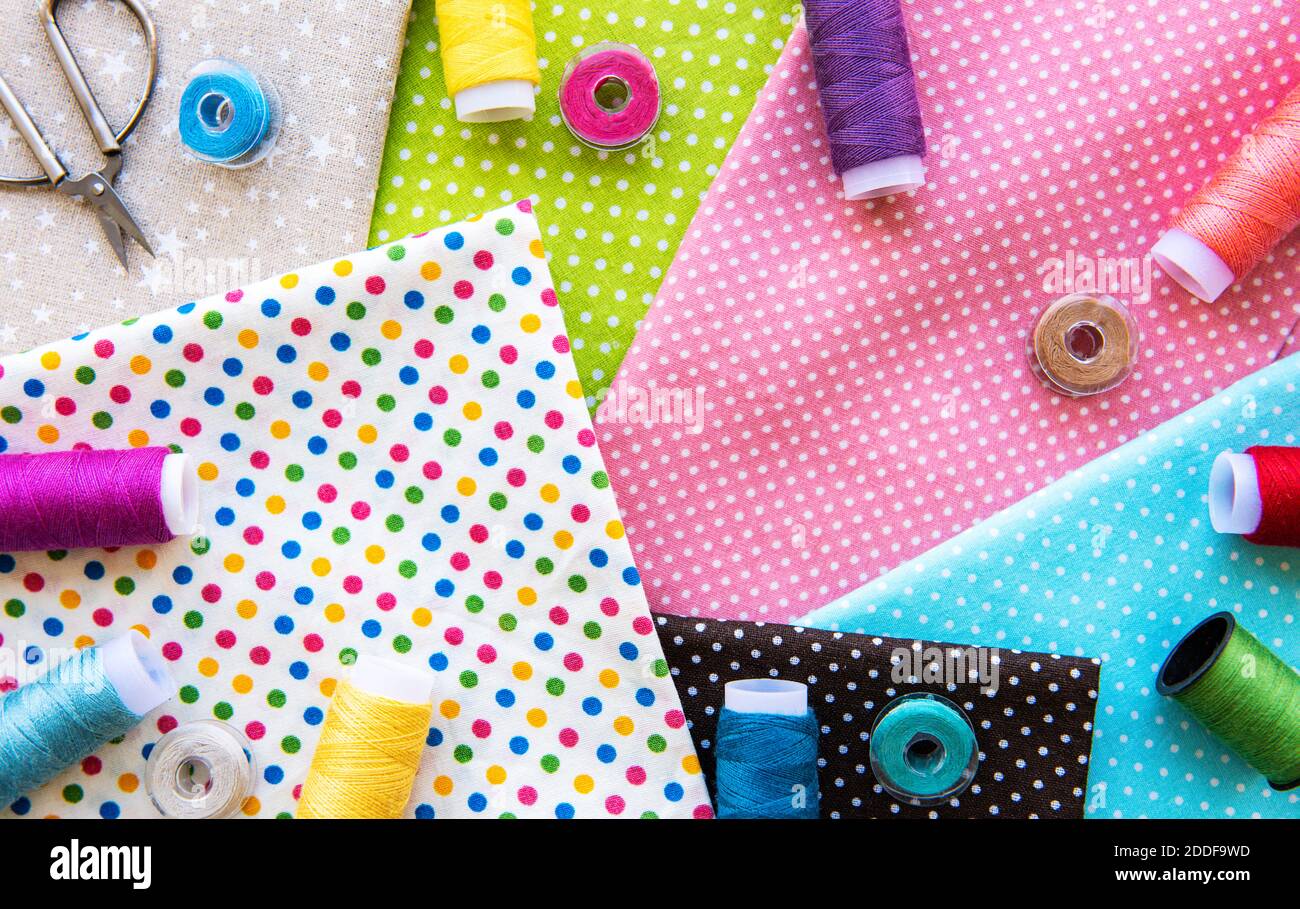 Sewing accessories and fabric. Top view, flat lay. Stock Photo