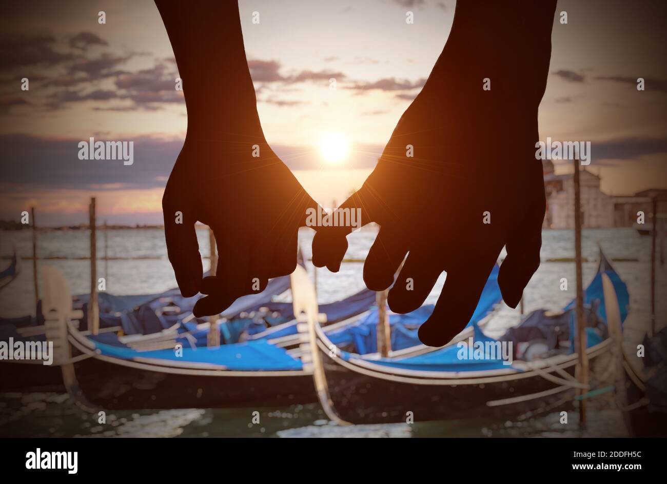 Two hands touching silhouette hi-res stock photography and images - Alamy