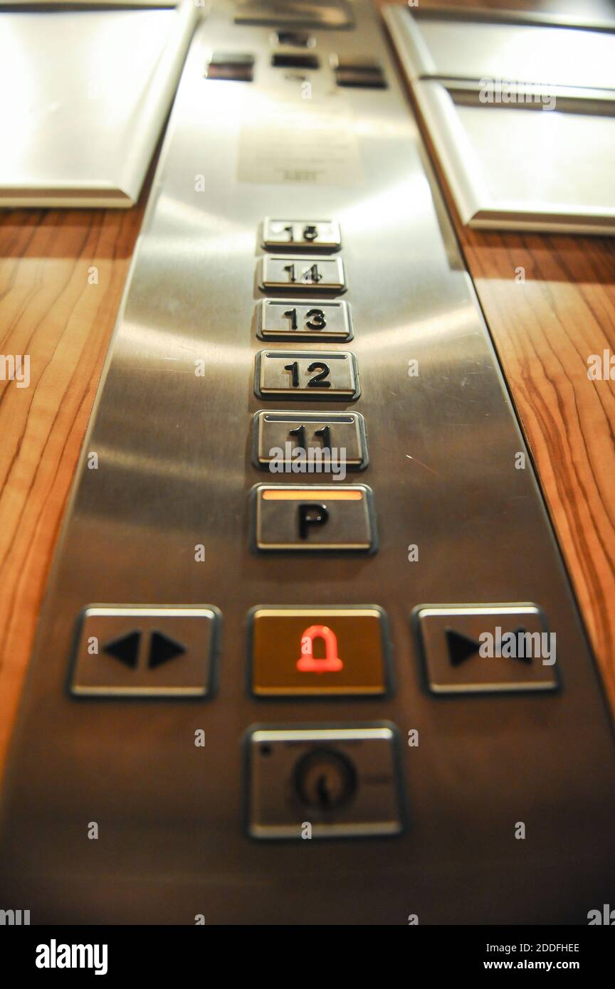 Shallow depth of field (selective focus) image with the buttons inside an elevator. Stock Photo