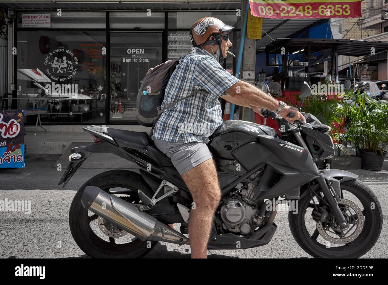 Smoking motorbike hi-res stock photography and images
