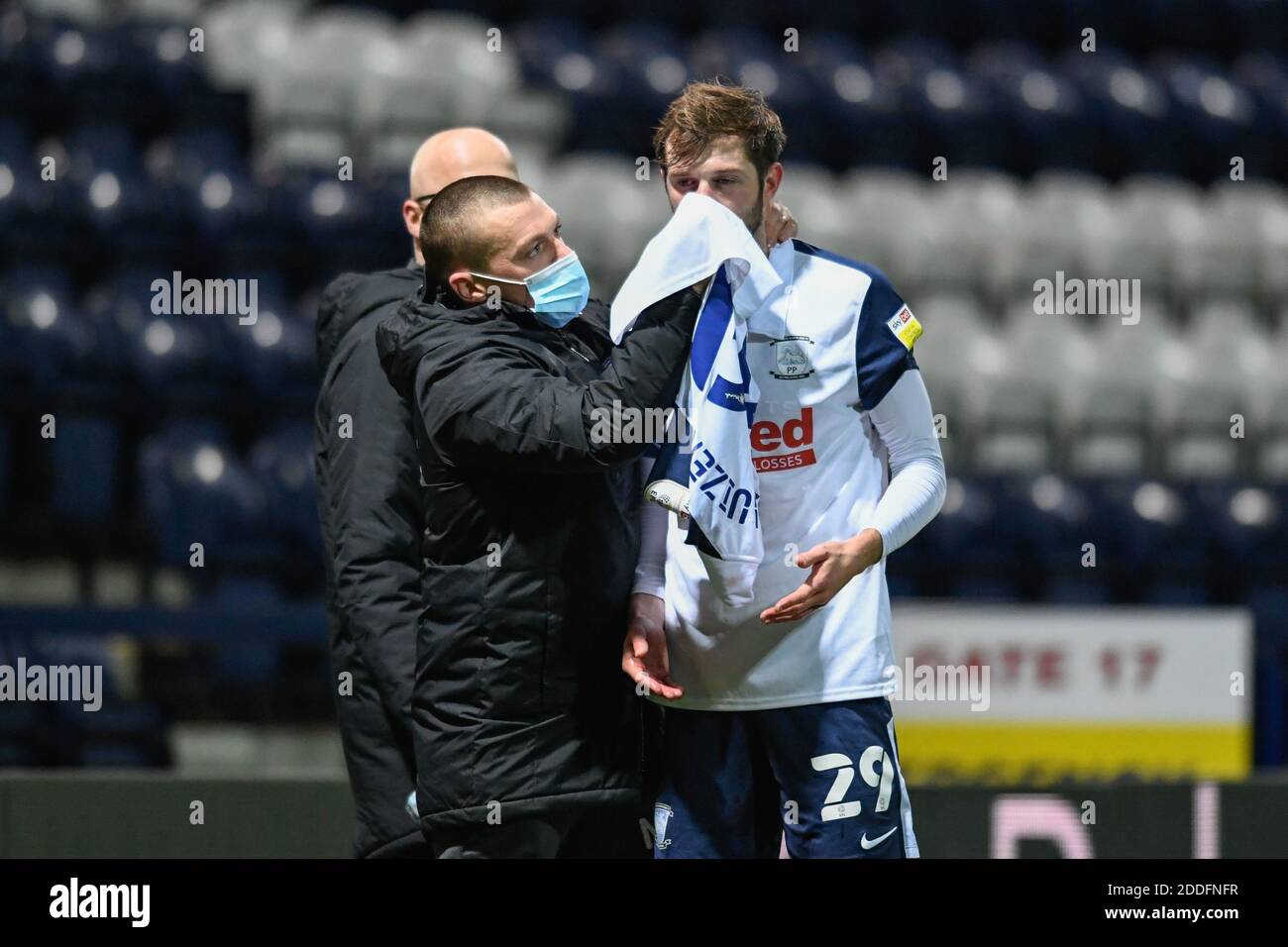 Tom Barkhuizen #29 of Preston North End continues to receive treatment on the side of the pitch after an injury Stock Photo