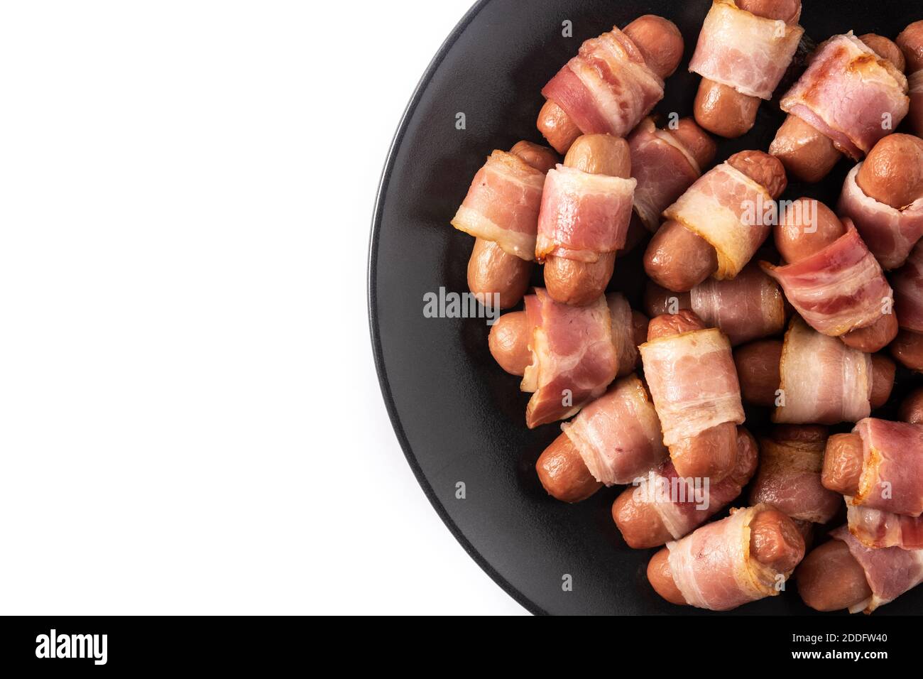 Pig in blankets. Sausages wrapped in smoked bacon isolated on white background Stock Photo Alamy
