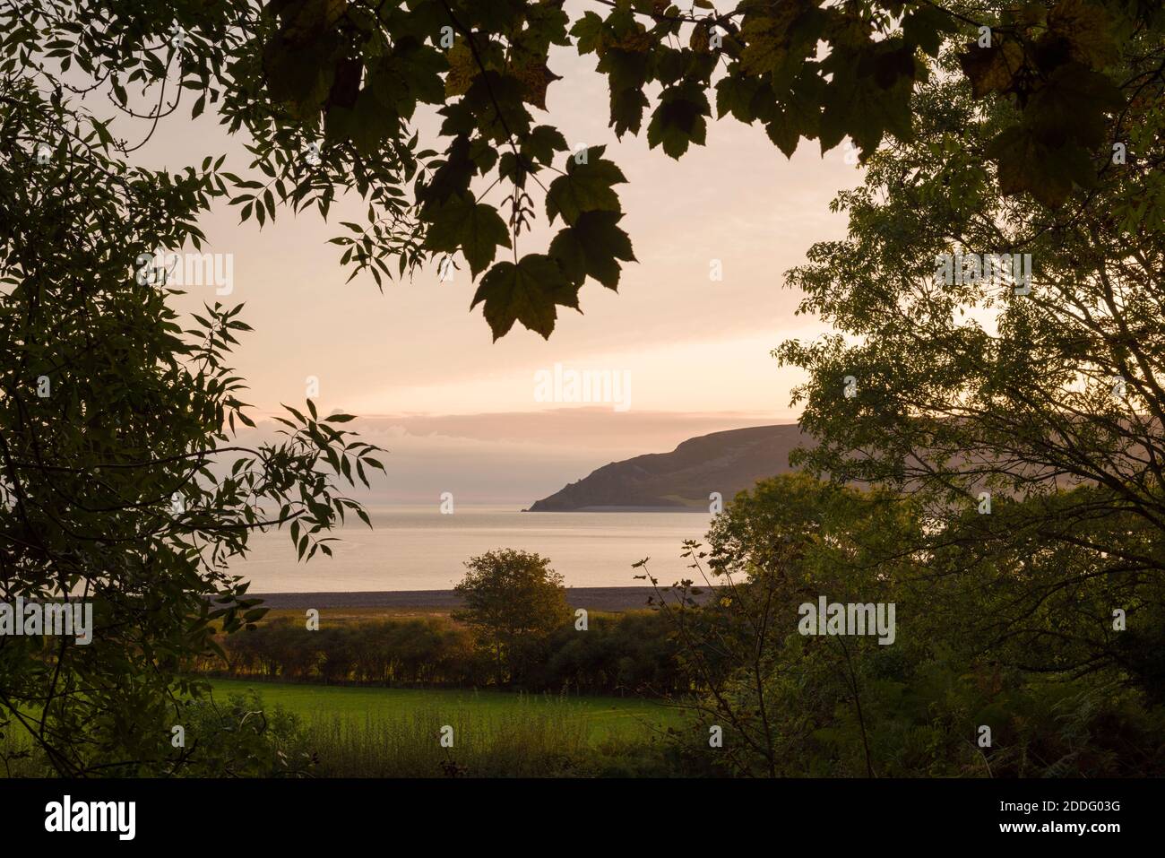 Morning light over Porlock Bay and Bossington Hill viewed from Worthy in Exmoor National Park, Somerset, England. Stock Photo