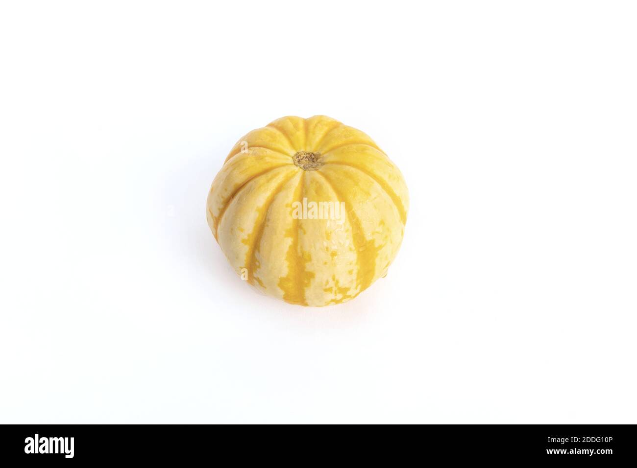 A yellow pumpkin isolated on a white background Stock Photo - Alamy