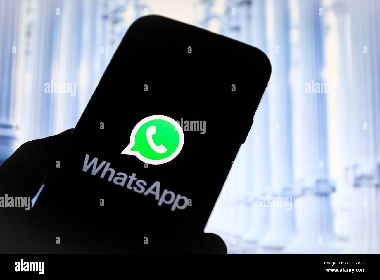 In this photo illustration a Whatsapp online communicator app logo seen displayed on a smartphone. Stock Photo